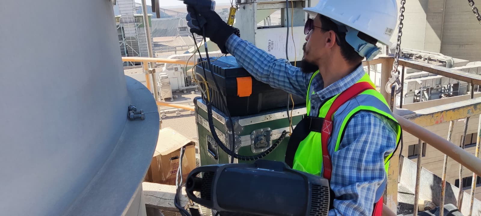 Engineer operating isokinetic sampling equipment